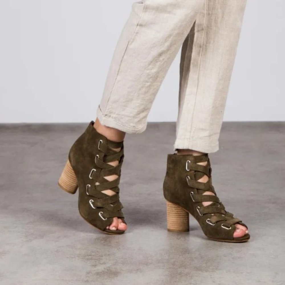 Lace up leather wooden block heels by Jeffery Campbell